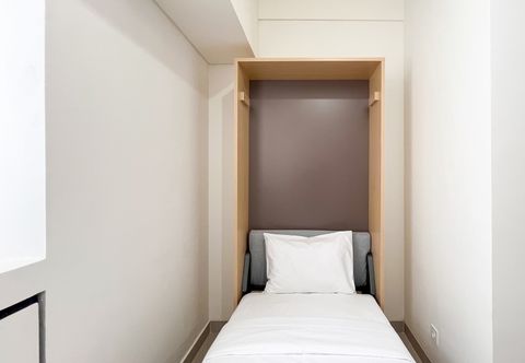 Bedroom Modern Look Studio (No Kitchen) Apartment at Bandaraya - Tallasa City Makassar By Travelio