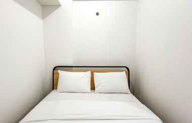 Bedroom 2 Homey 1BR (No Kitchen) Apartment at Bandaraya - Tallasa City Makassar By Travelio