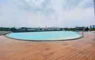 Kolam Renang 7 Simply Look 1BR with Extra Room Apartment Patraland Urbano By Travelio