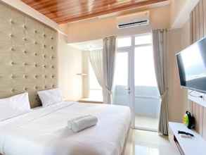 Bedroom 4 Modern Studio Apartment at Vasanta Innopark By Travelio
