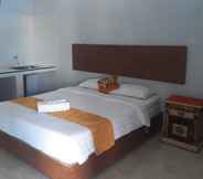 Bedroom 7 Graha Dewata Home by Dadistay