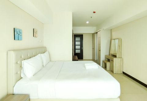 Bedroom Spacious Combine 2BR Apartment at Tamansari La Grande By Travelio
