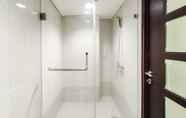 In-room Bathroom 4 Spacious Combine 2BR Apartment at Tamansari La Grande By Travelio