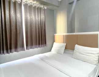 Bedroom 2 Best Strategic and Homey 2BR Apartment at Bassura City By Travelio