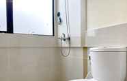 Toilet Kamar 4 Restful 2BR Apartment at Meikarta By Travelio