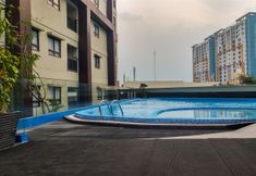 Swimming Pool 4 Homey and Good Deal Studio Apartment Atria Residences Gading Serpong By Travelio