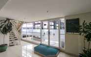 Lobby 6 Modern 1BR Parahyangan Residence Apartment By Travelio