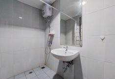 客房内浴室 3 Homey and Tranquil Studio at Casa De Parco Apartment By Travelio