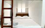 Kamar Tidur 2 Homey and Minimalist Studio at Transpark Juanda Bekasi Timur Apartment By Travelio