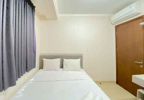 Bedroom Homey and Good Choice 2BR Signature Park Grande Apartment By Travelio