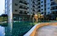 Swimming Pool 5 Homey and Good Choice 2BR Signature Park Grande Apartment By Travelio