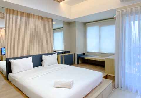 Bedroom Modern Look Studio Apartment at Gateway Park LRT City Bekasi By Travelio