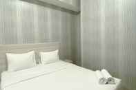 Bedroom Restful and Modern Look 2BR Vasanta Innopark Apartment By Travelio