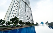 ล็อบบี้ 6 Restful and Modern Look 2BR Vasanta Innopark Apartment By Travelio