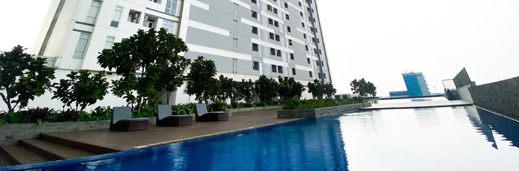 ล็อบบี้ Restful and Modern Look 2BR Vasanta Innopark Apartment By Travelio