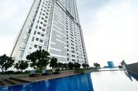 ล็อบบี้ Restful and Modern Look 2BR Vasanta Innopark Apartment By Travelio