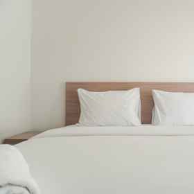 Bedroom 1 Homey and Modern Look Studio Apartment Amazana Serpong By Travelio, DISTRIBUTOR RESMI NASA BINTARO Hotels