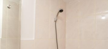 In-room Bathroom 3 Homey and Modern Look Studio Apartment Amazana Serpong By Travelio