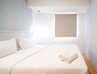 Bedroom 2 Homey and New 2BR Apartment at Suncity Residence By Travelio