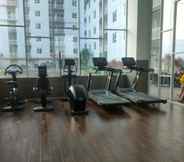 Fitness Center 7 Homey and New 2BR Apartment at Suncity Residence By Travelio