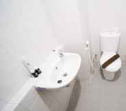 In-room Bathroom 4 Homey and New 2BR Apartment at Suncity Residence By Travelio