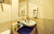 In-room Bathroom 6 Strategic and Best Choice 2BR Apartment at Grand Setiabudi By Travelio