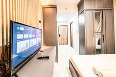 Others Comfy Studio at Delft Ciputra Makassar Apartment By Travelio