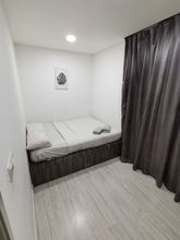 Kamar Tidur 4 reStary Muji Themed Homestay