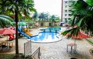 Swimming Pool 5 Homey and Modern 1BR at Kebagusan City Apartment By Travelio