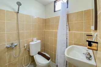 In-room Bathroom 4 Cozy Living Studio Apartment at Kebagusan City By Travelio