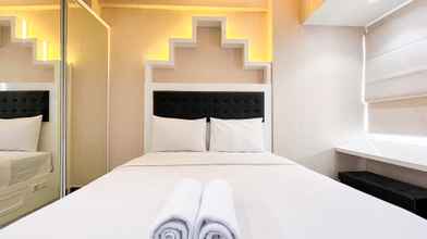 Bedroom Cozy Living and Simply Studio Vida View Makassar Apartment By Travelio