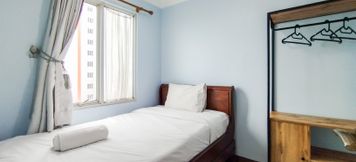 Bedroom 2 Serene 2BR Apartment at Galeri Ciumbuleuit 1 By Travelio