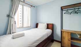 Bedroom 2 Serene 2BR Apartment at Galeri Ciumbuleuit 1 By Travelio