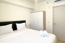 Kamar Tidur Spacious and Comfortable 3BR Meikarta Apartment By Travelio