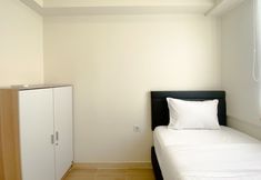 Bedroom 2 Spacious and Comfortable 3BR Meikarta Apartment By Travelio