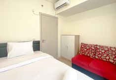 Bedroom 3 Spacious and Comfortable 3BR Meikarta Apartment By Travelio