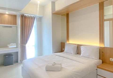 Bedroom Restful and Best Deal 1BR Vasanta Innopark Apartment By Travelio