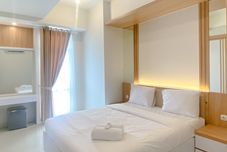 Bedroom Restful and Best Deal 1BR Vasanta Innopark Apartment By Travelio