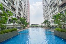 Kolam Renang Cozy and Good Choice Studio LRT City Jatibening Apartment By Travelio