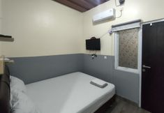 Bedroom 2 Puspiptek Residence Syariah Mitra RedDoorz