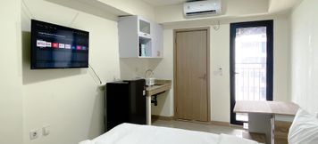 Common Space 2 Minimalist Studio for 1 Pax Meikarta Apartment By Travelio