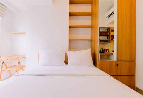 Bedroom Comfy Studio and Modern Look Tokyo Riverside PIK 2 Apartment By Travelio
