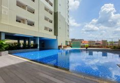 Swimming Pool 7 Modern and Homey 2BR at Loftvilles City Apartment By Travelio