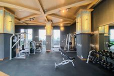 Fitness Center Homey and Cozy Living Studio Apartment at Collins Boulevard By Travelio