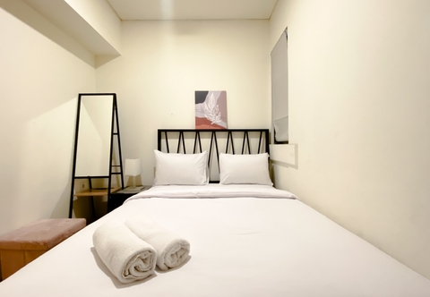 Bedroom Clean and Homey 2BR Apartment at Meikarta By Travelio