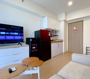 Common Space 3 Clean and Homey 2BR Apartment at Meikarta By Travelio