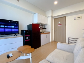 Common Space 4 Clean and Homey 2BR Apartment at Meikarta By Travelio