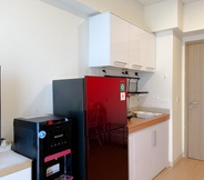 Common Space 4 Clean and Homey 2BR Apartment at Meikarta By Travelio