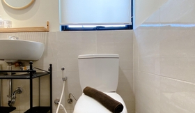 In-room Bathroom 5 Clean and Homey 2BR Apartment at Meikarta By Travelio