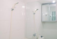 In-room Bathroom 7 Strategic and Comfy 2BR Apartment at Bassura City By Travelio